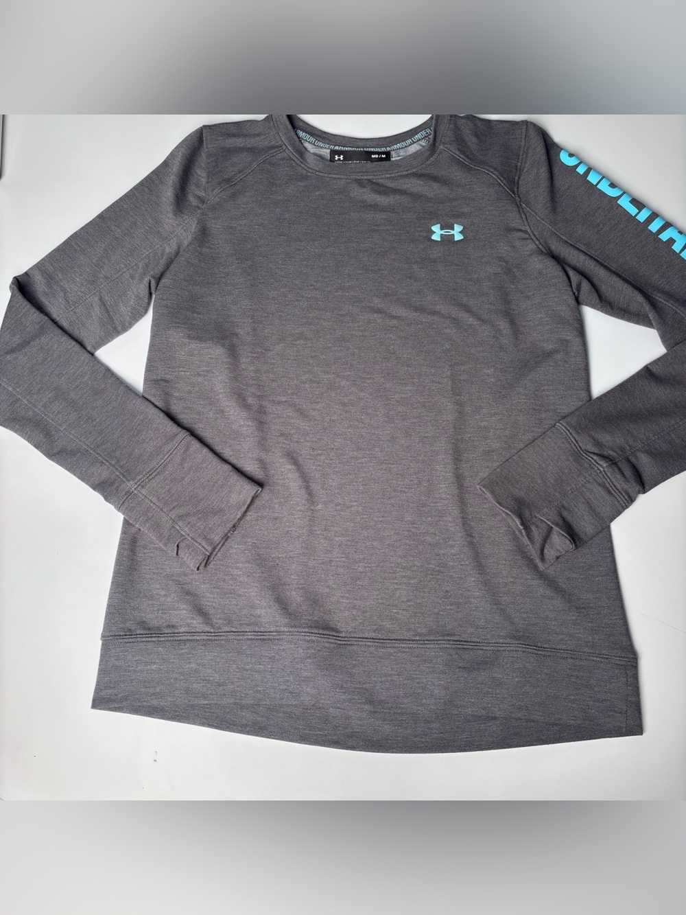 Under Armour ColdGear long-sleeve crewneck with Turquoise lettering